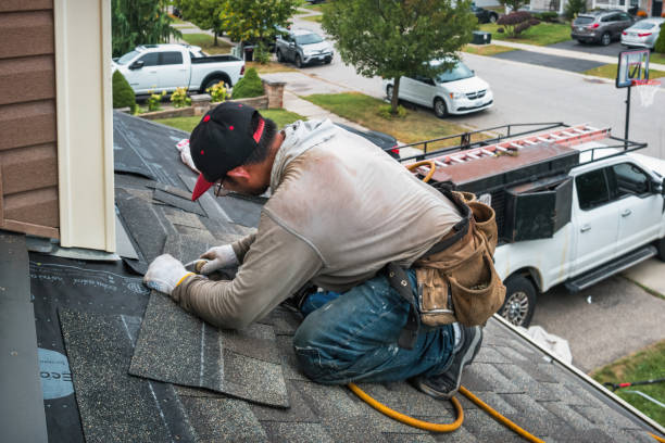 Professional Gutter Repair And Installation technician working in Grafton, OH
